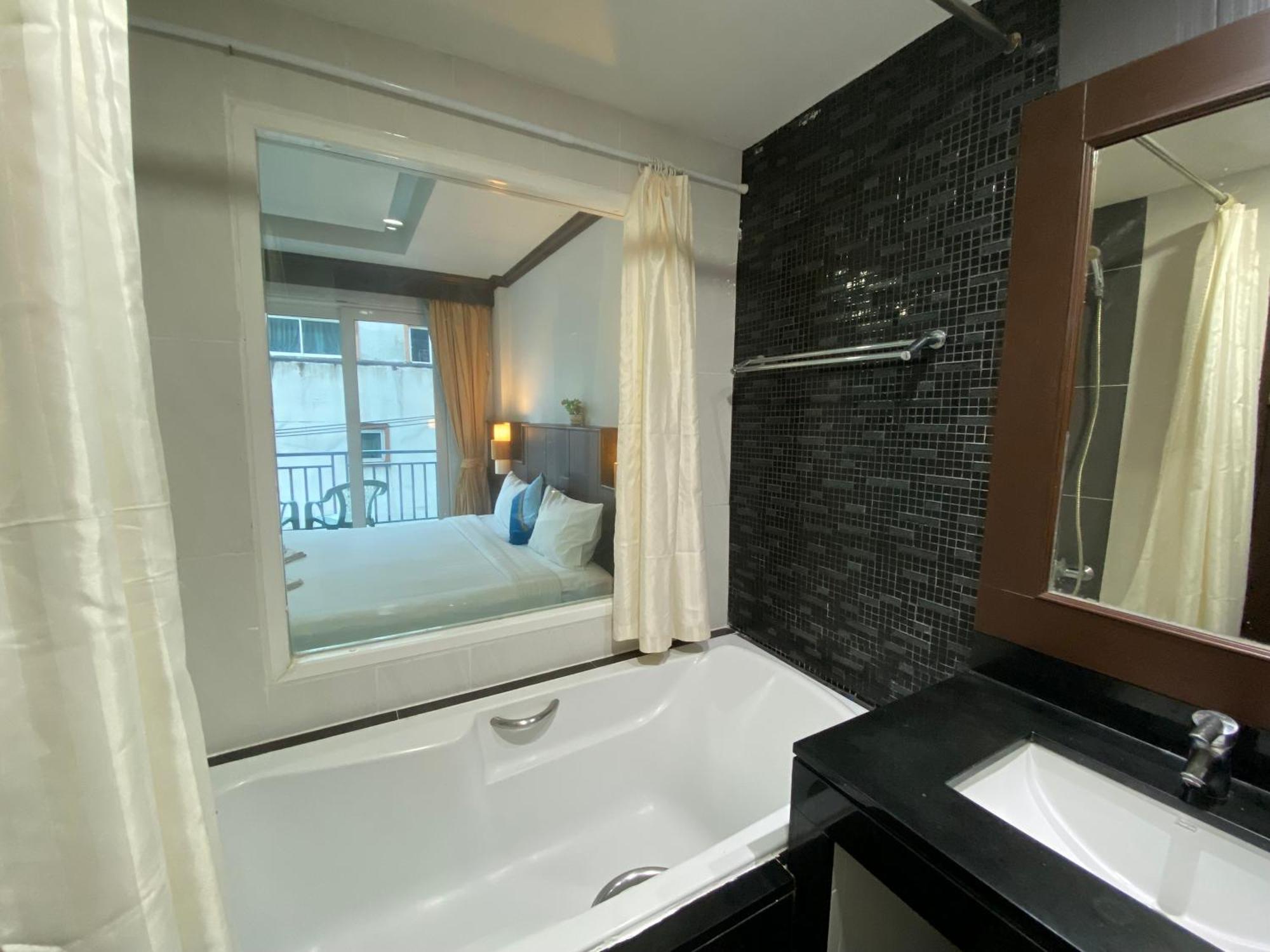 77 Patong Hotel & Spa Værelse billede